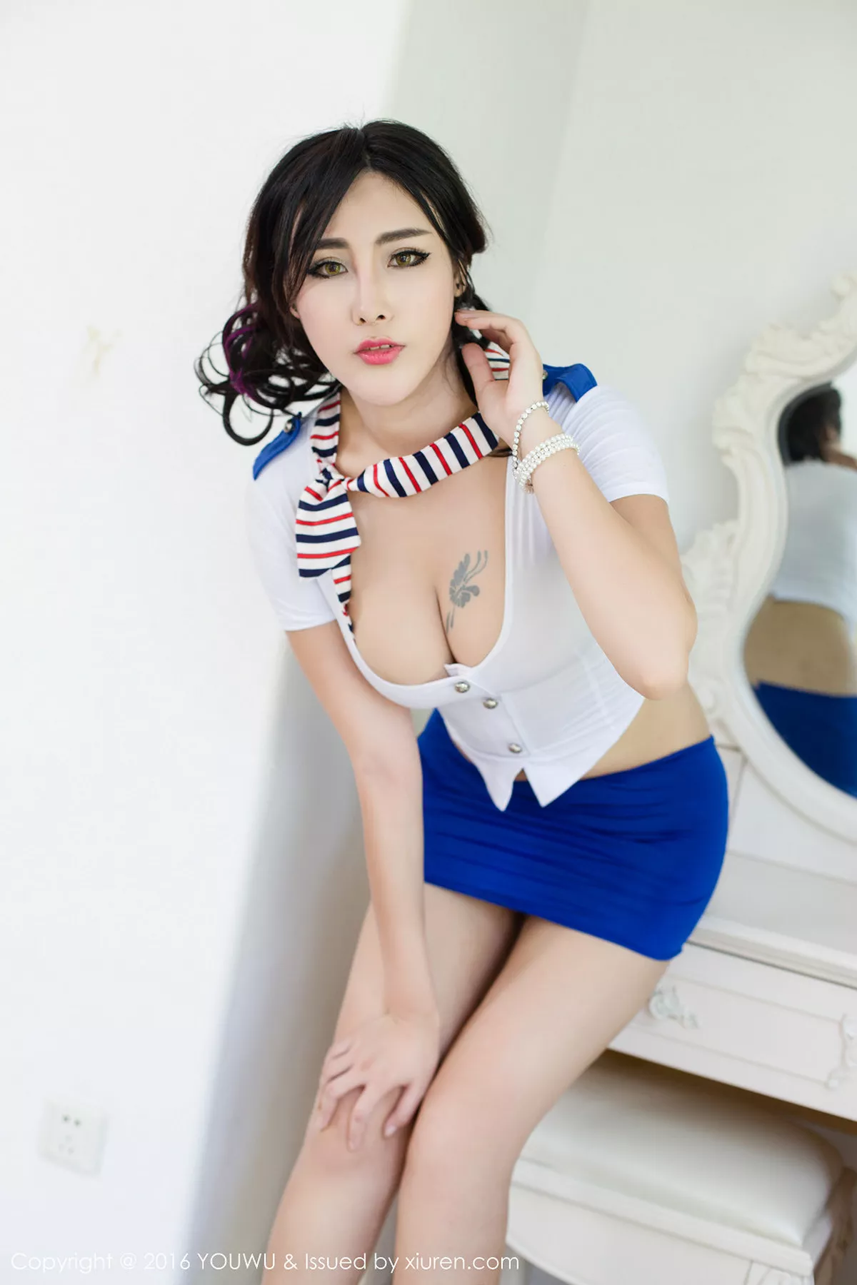 秀人集.com_[YouWu尤物馆]Vol.031_嫩模FoxYini孟狐狸空姐制服秀半球撩人姿势诱惑写真56P