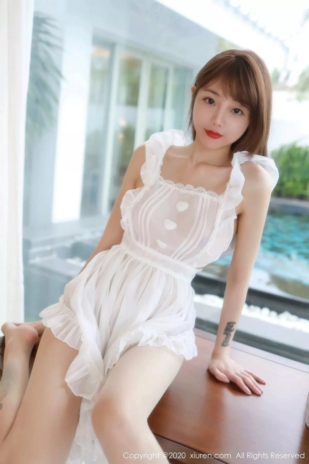 秀人集.com_[XiuRen秀人网]No.2869_嫩模佘贝拉bella三亚旅拍淡雅薄纱裙透视秀火辣身材诱惑写真42P